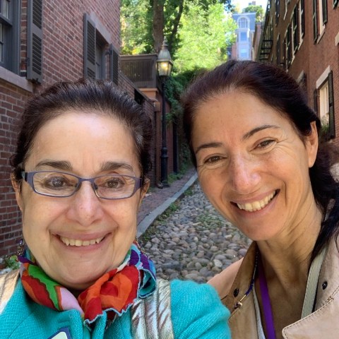 a man and a woman smiling for the camera