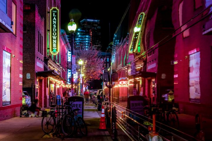 a close up of a busy city street at night