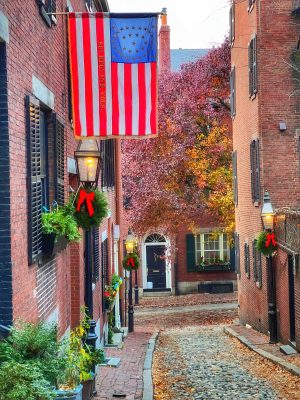 a close up of a street in front of a brick building